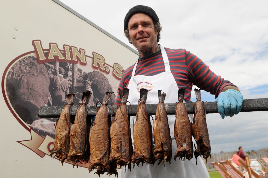 One of the traditional stalls at Sea Fest in August - Robbie Boyd was serving up Smokies on the Iain R Spink stall.