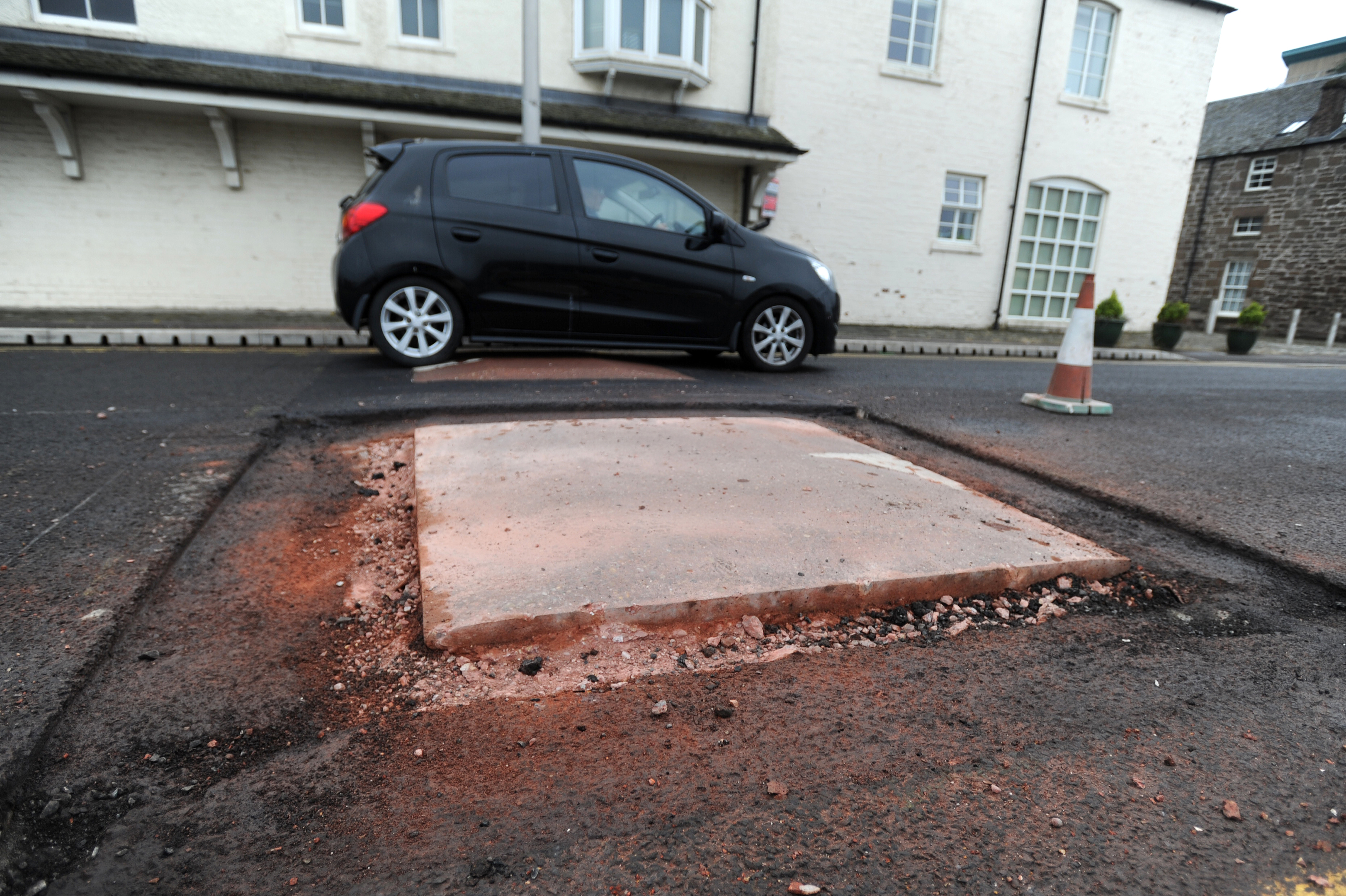 Work has begun to reduce the effect of the bumps by building up the surrounding tarmac.