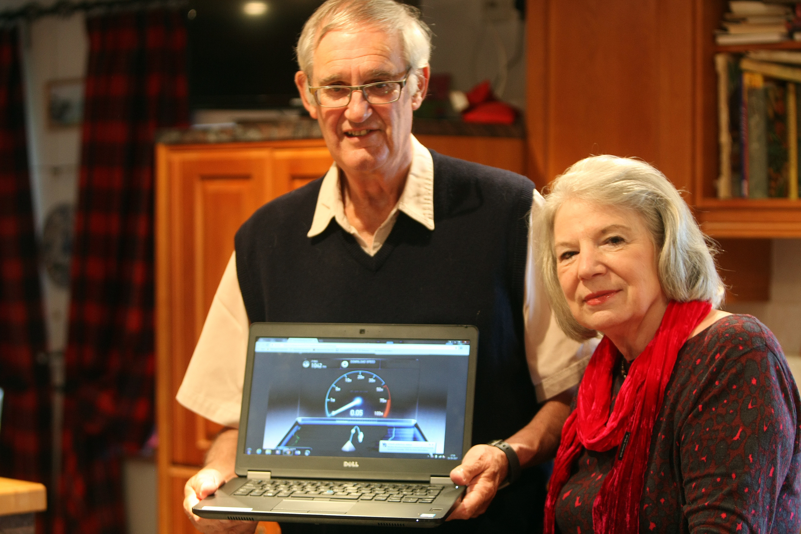 Tony and Diana Peters with a broadband speed test at their home in Kinneff.