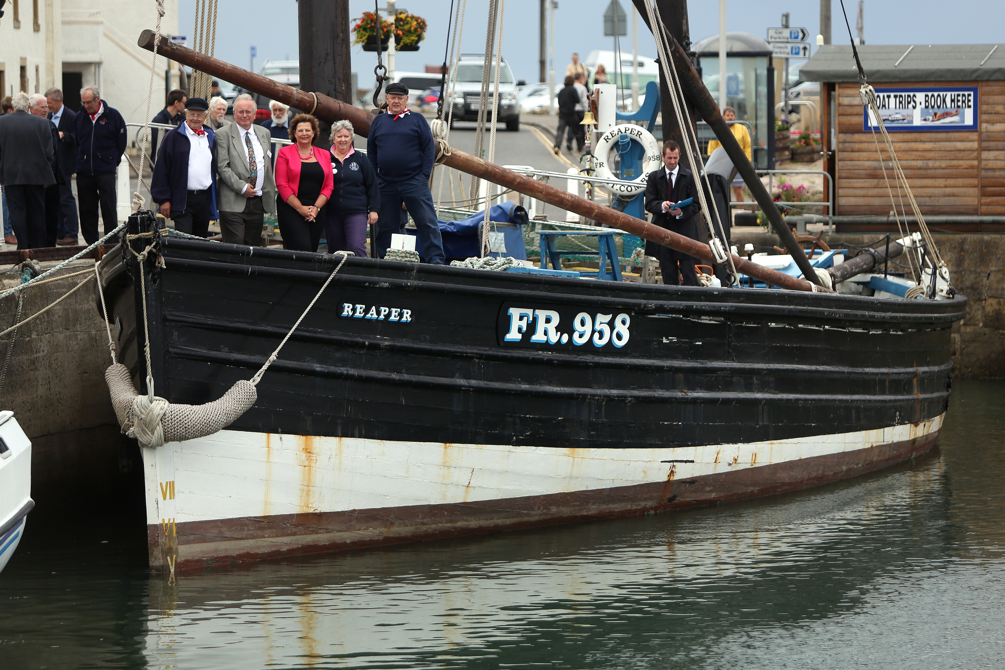 Culture Secretary Fiona Hyslop aboard the Reaper with volunteers who help keep the Reaper afloat.