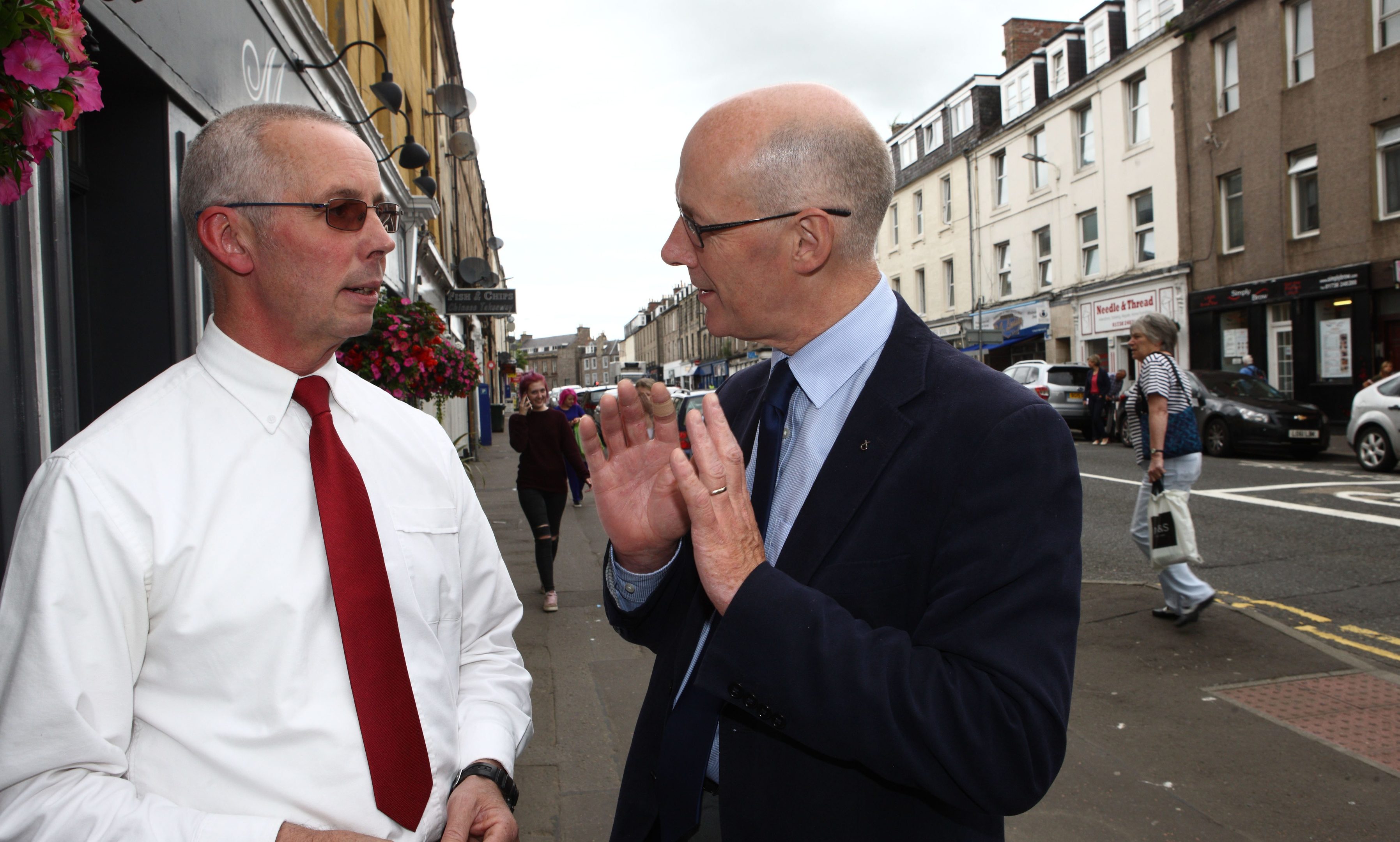 Deputy First Minister John swinney MSP tours N Methven St in Perth with Keith Fergie