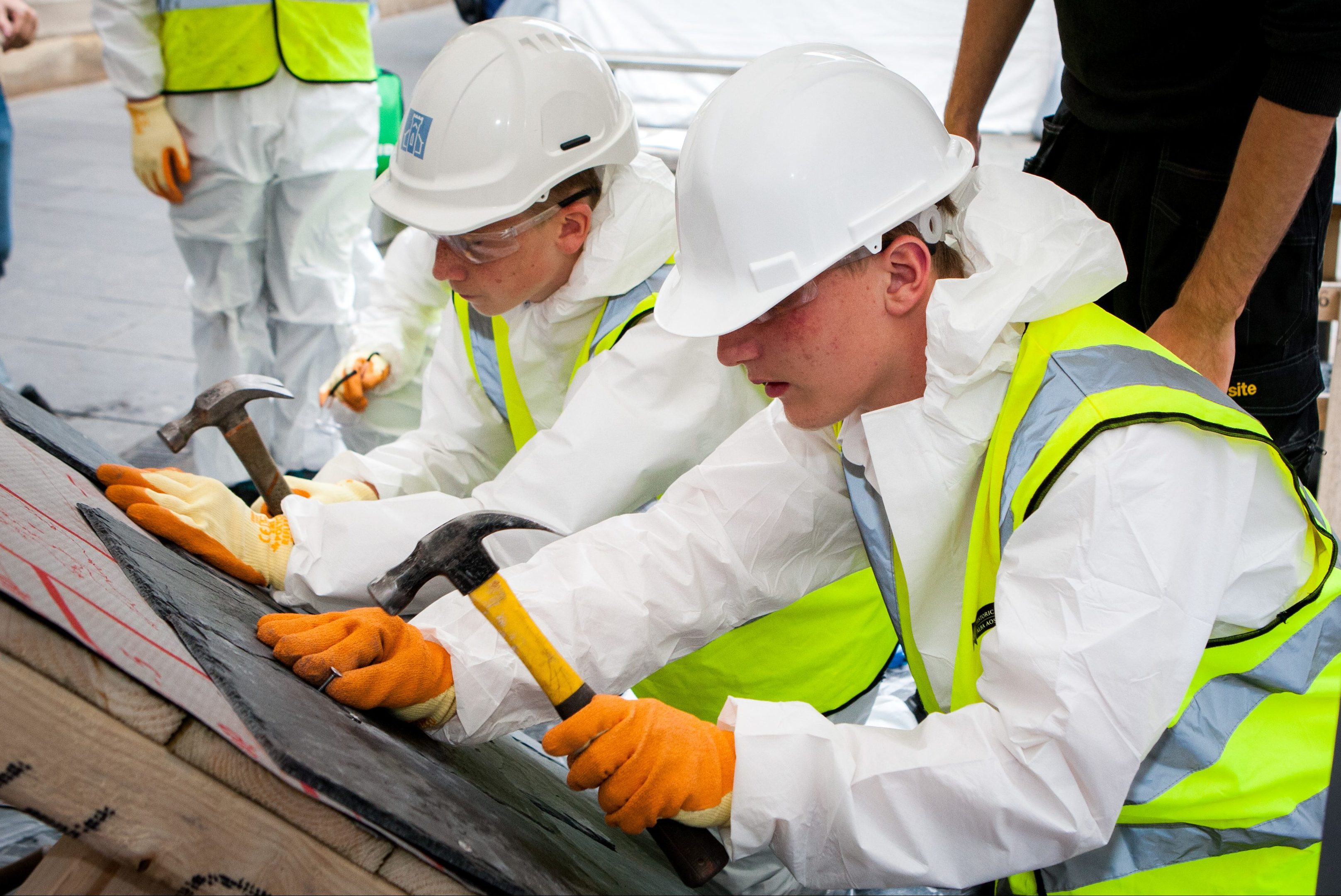 Pupils from Pitlochry High School trying their roofing skills at a previous event.