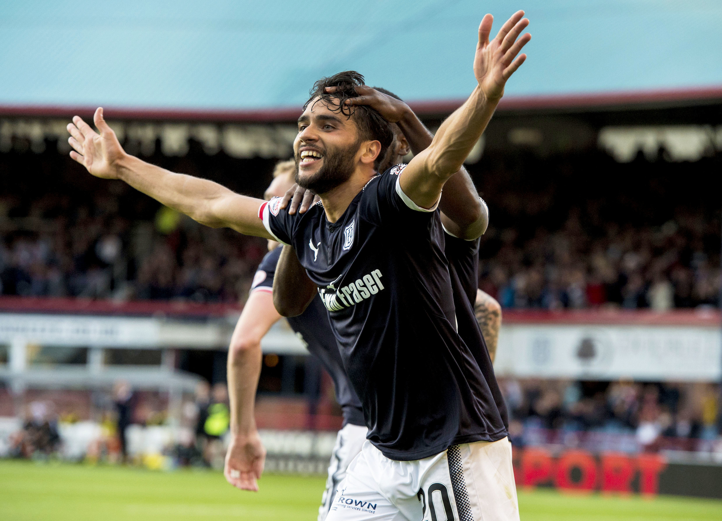 Dundee's Faissal El Bakhtaoui celebrates his goal.