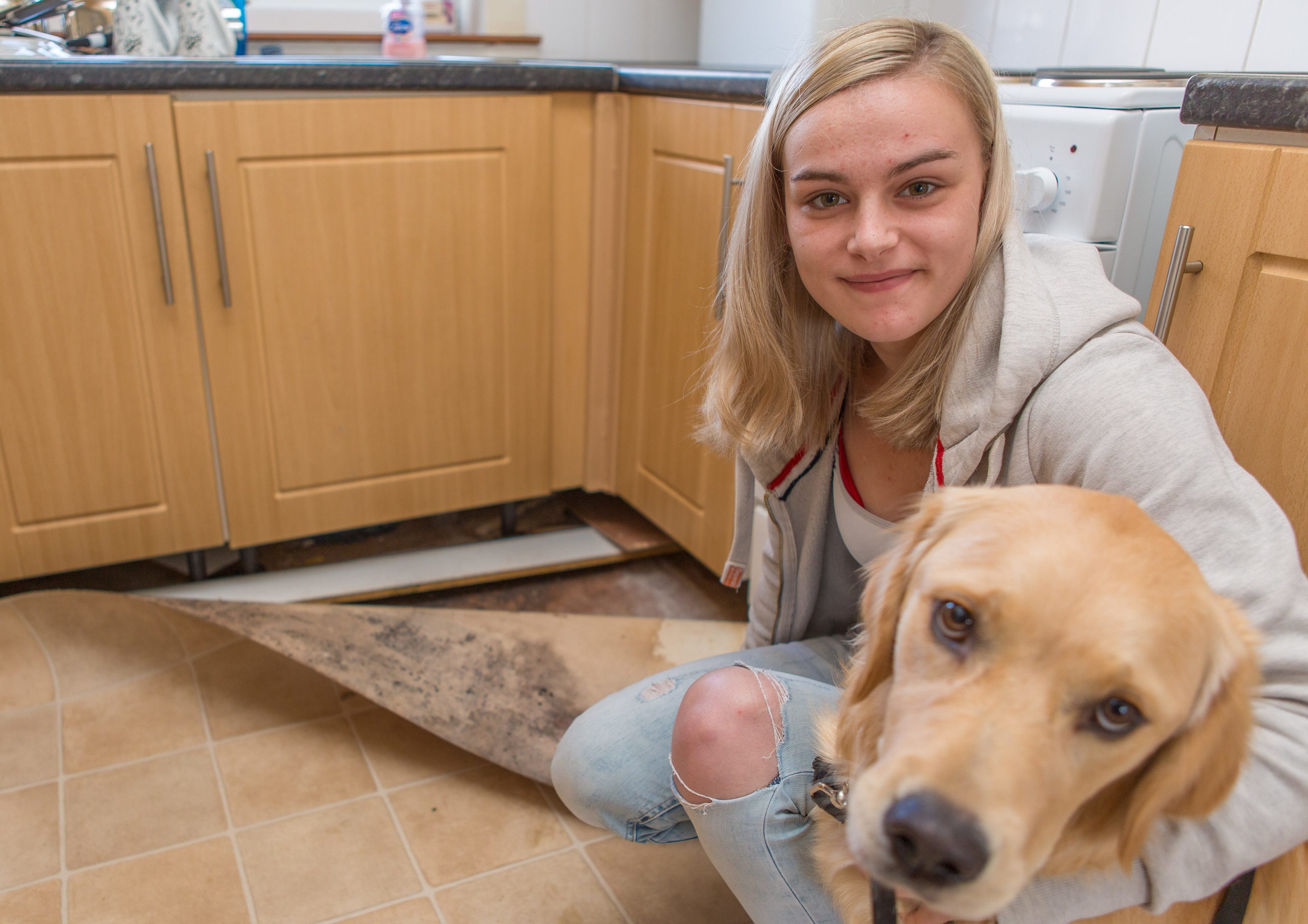 Demi McVeigh and her dog, Bailey, at the Perth flat.