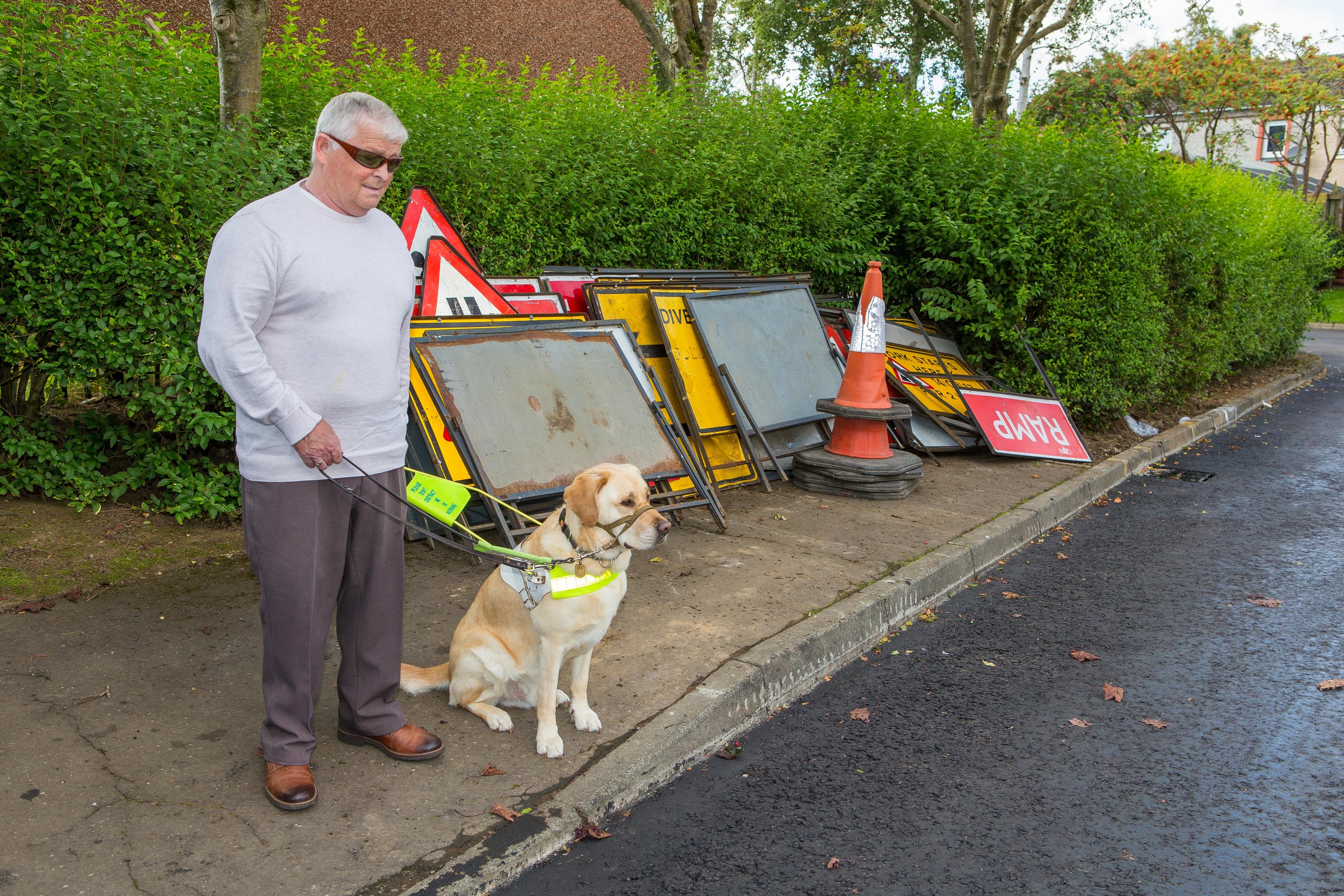 Iain Muir and his guide dog Tel.