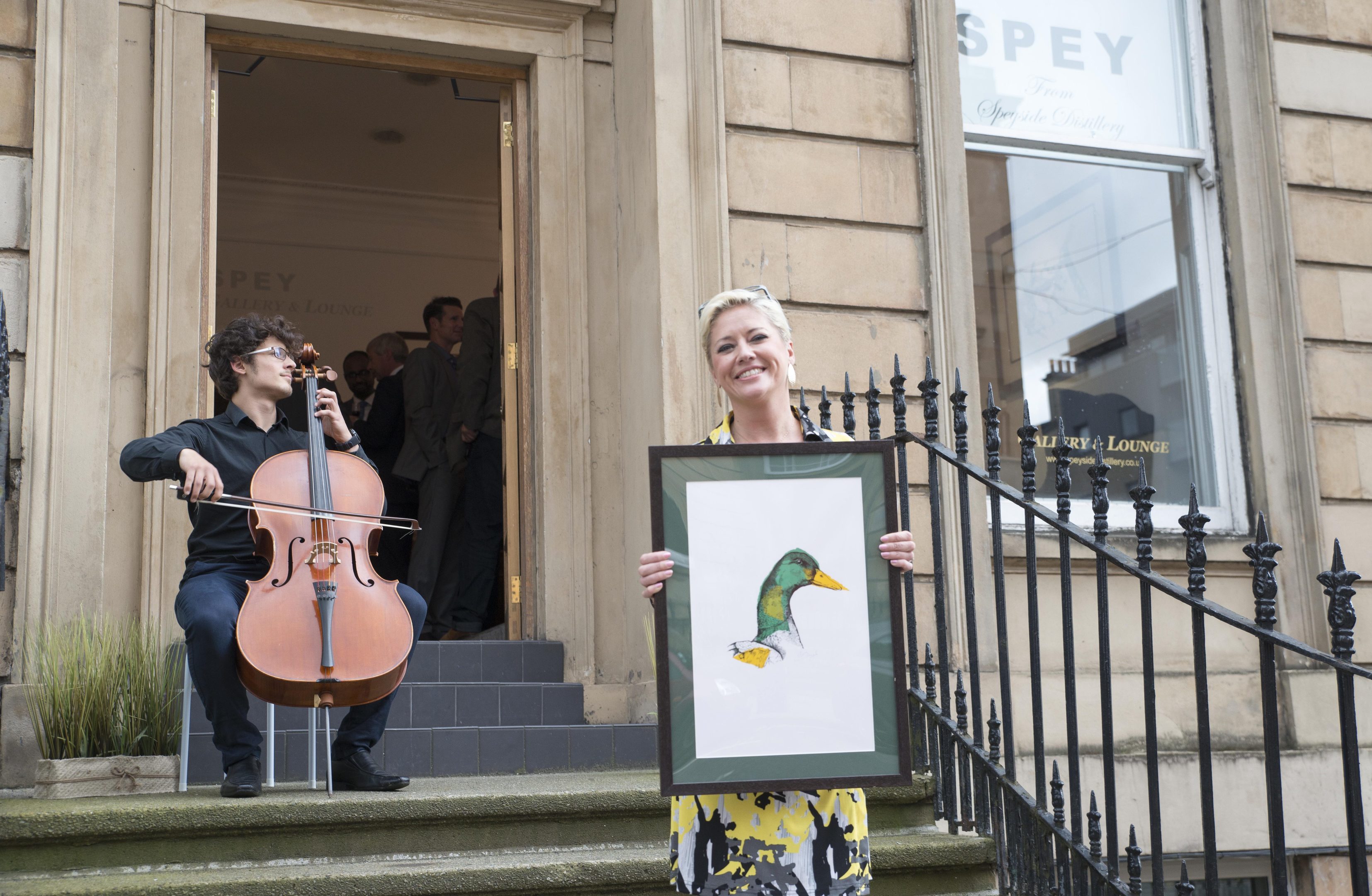 Joanna McDonough, Artist in Residence at Speyside Distillery, in front of the new SPEY Gallery and Lounge on Bath Street, Glasgow.