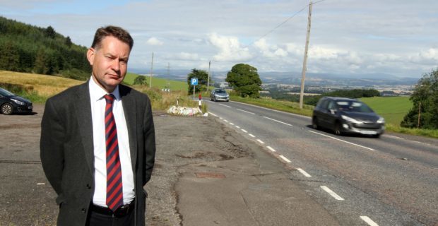 Murdo Fraser would like road signs to show the number of casualties.