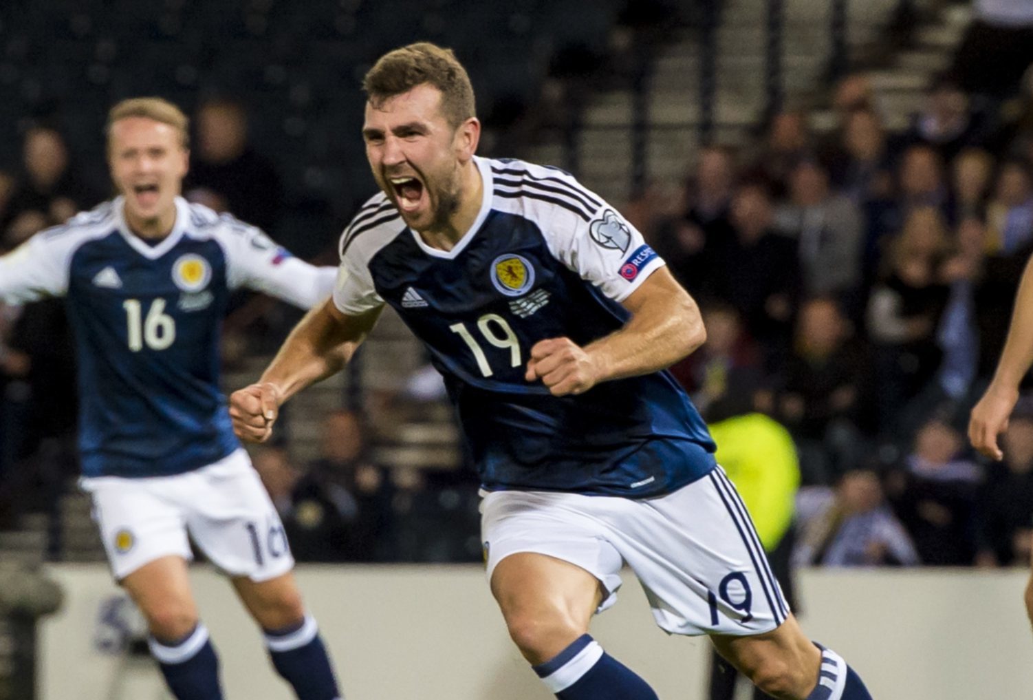 James McArthur after scoring against Lithuania.