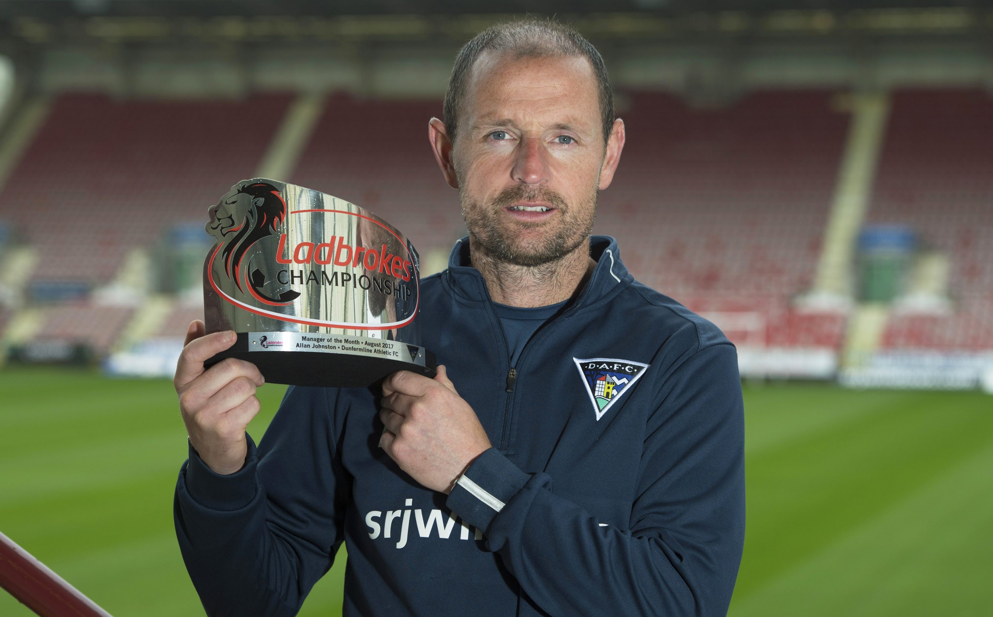 Allan Johnston with his Ladbrokes manager of the month award.