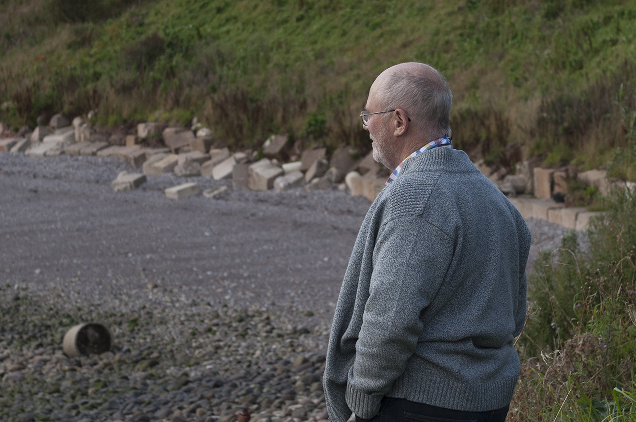 A visitor to Catterline overlooking some of the damage at the main road