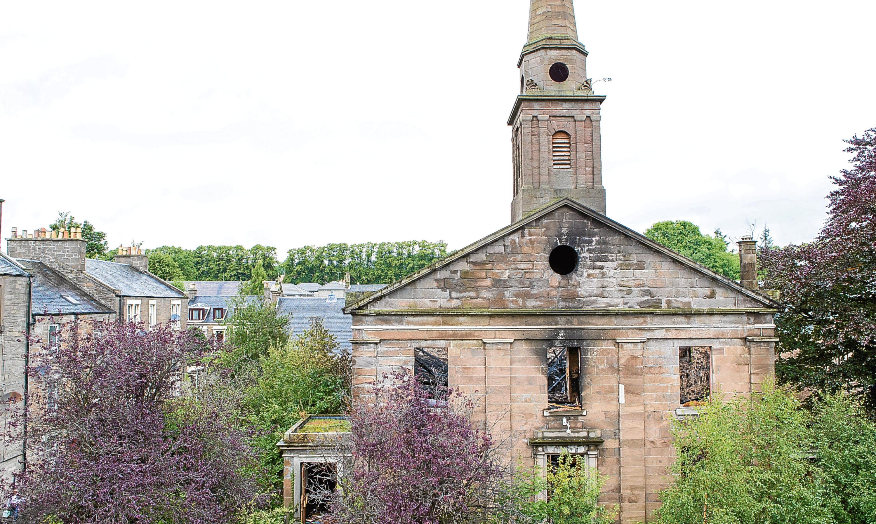 The fire-damaged Lochee church which housed several congregations over the years.
