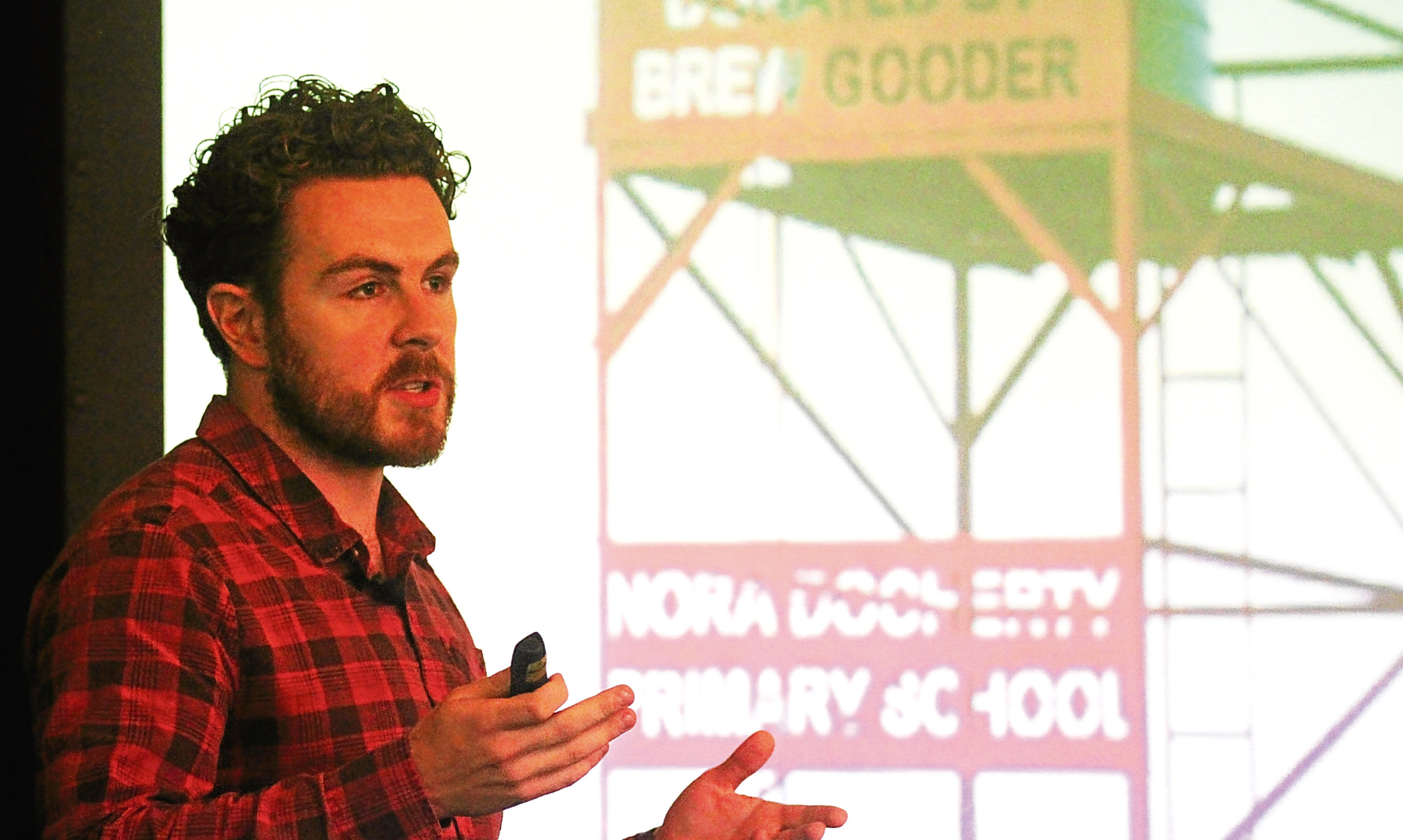 Alan Mahon of Brewgooder speaking at the business lunch