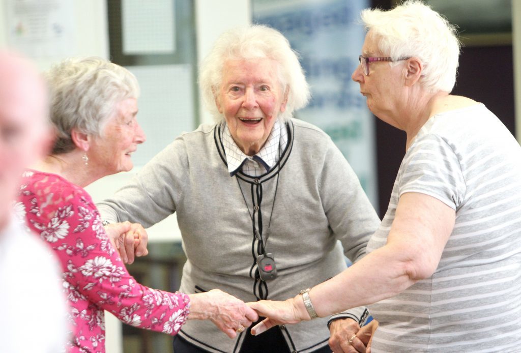 Clients enjoying entertainment at Dundee Age Concern