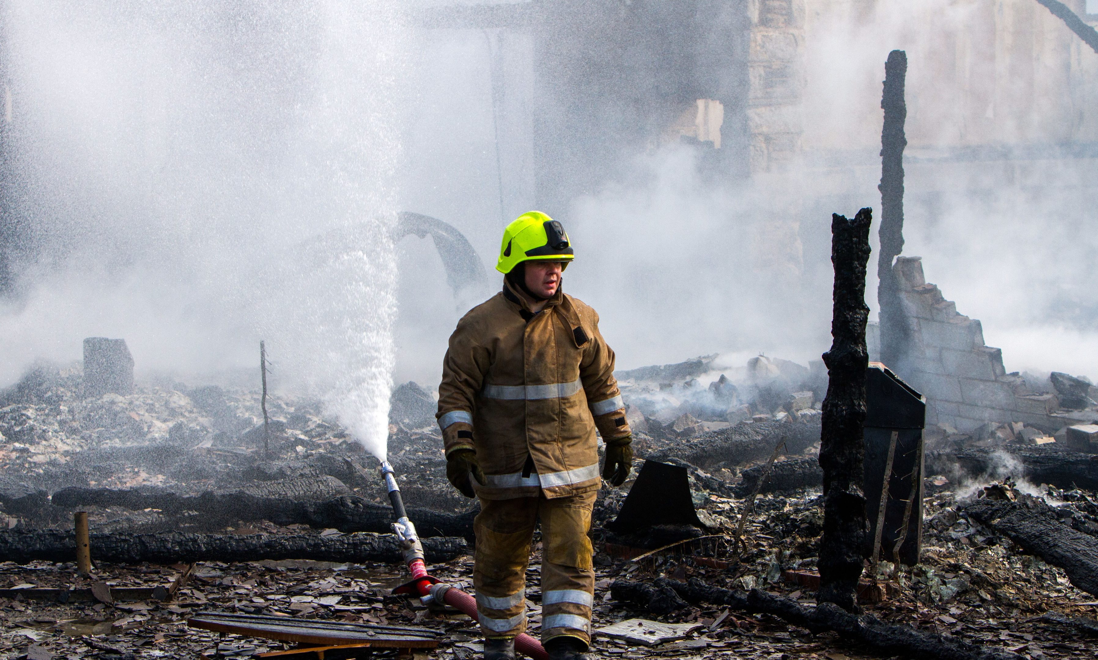 Fire crews at the scene of the Spittal of Glenshee Hotel fire in August 2014.