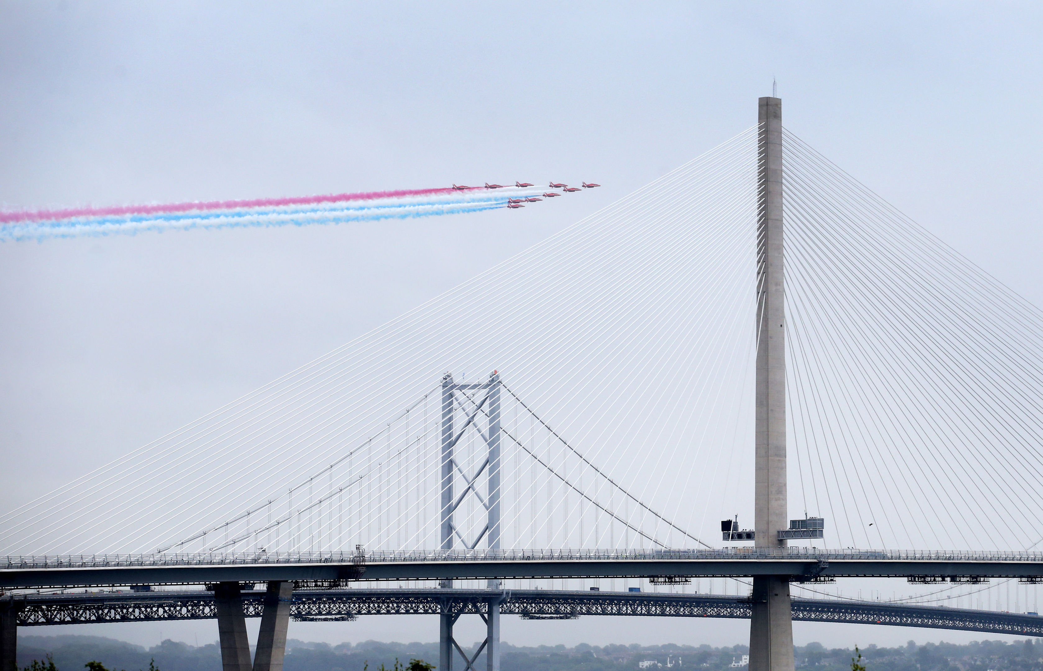 The Red Arrows fly past during the official opening of the Queensferry Crossing.