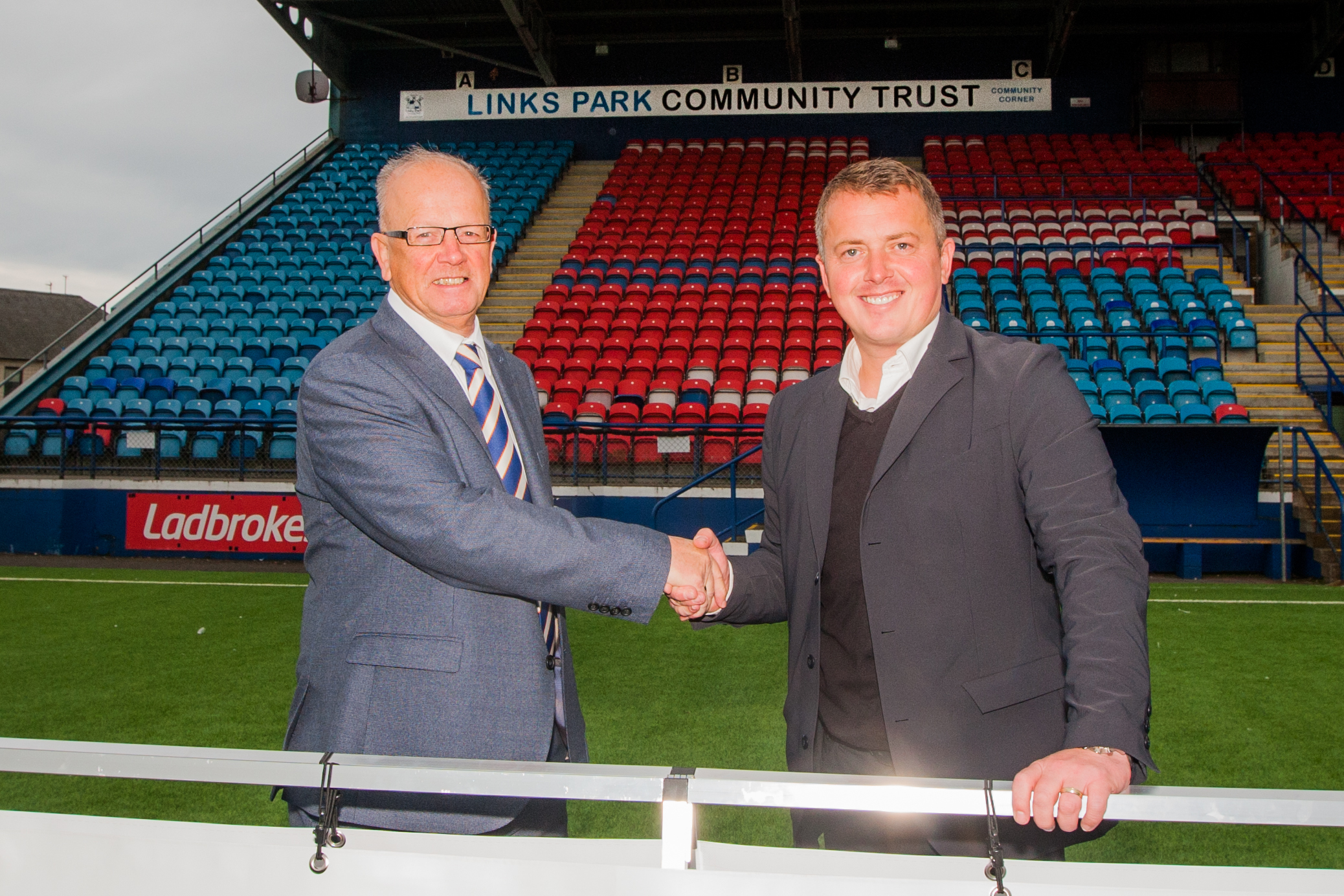 Picture shows club chairman John Crawford (left) and Peter Davidson (LPCT Chief Executive, right).