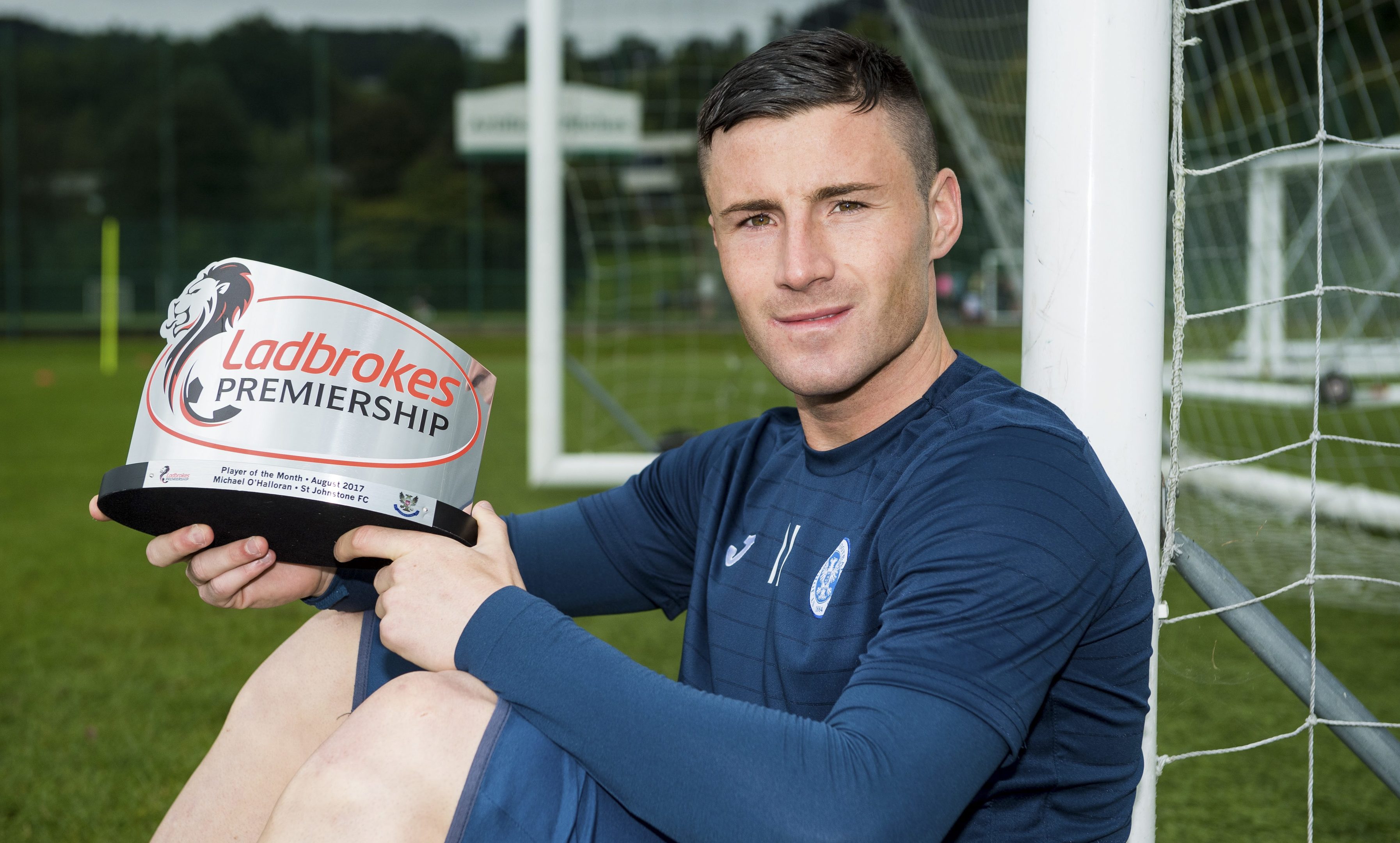 Michael O'Halloran with his Ladbrokes Premiership Player of the Month award for August.