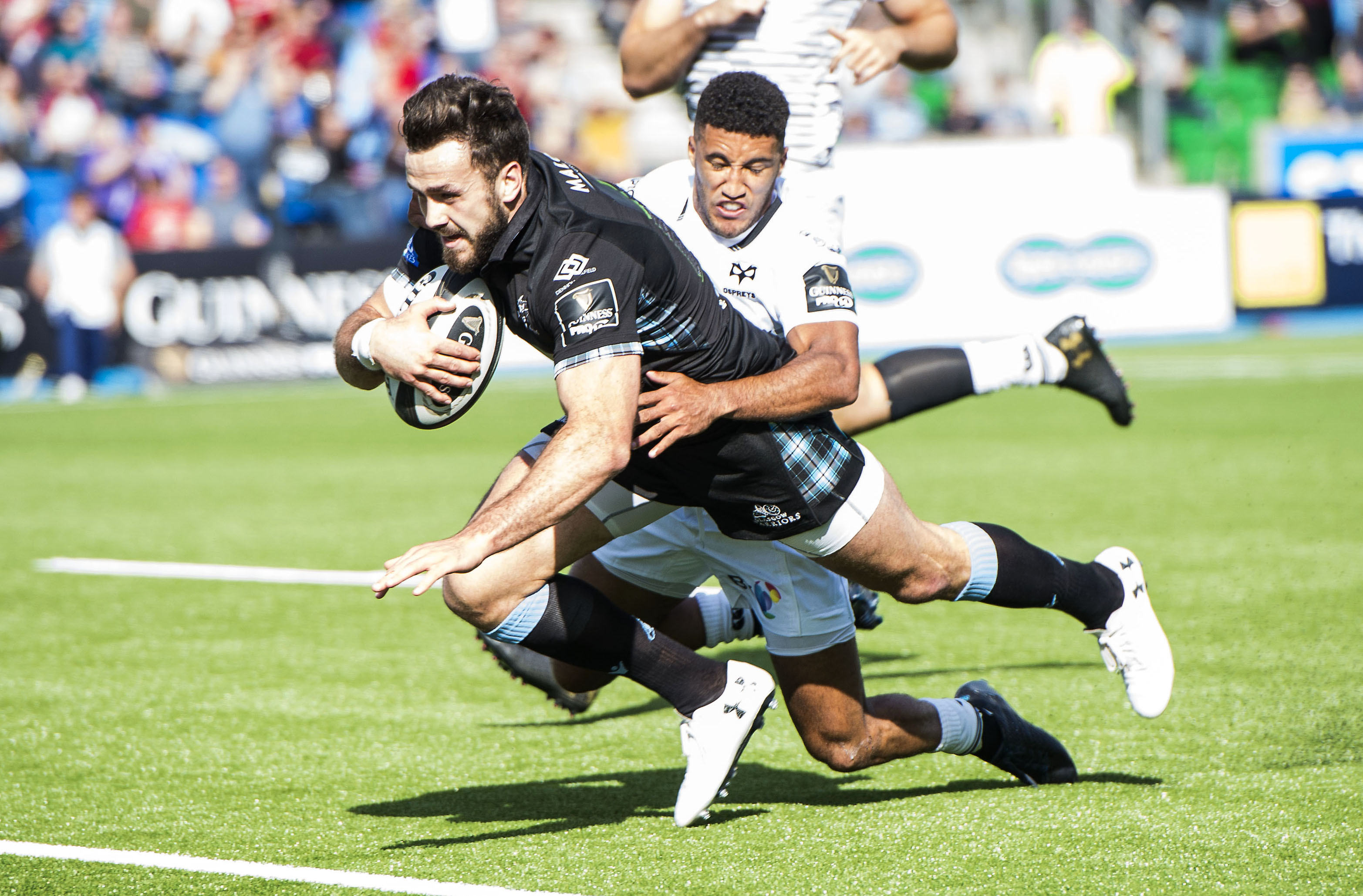 Alex Dunbar breaks through to score the opening try at Scotstoun.