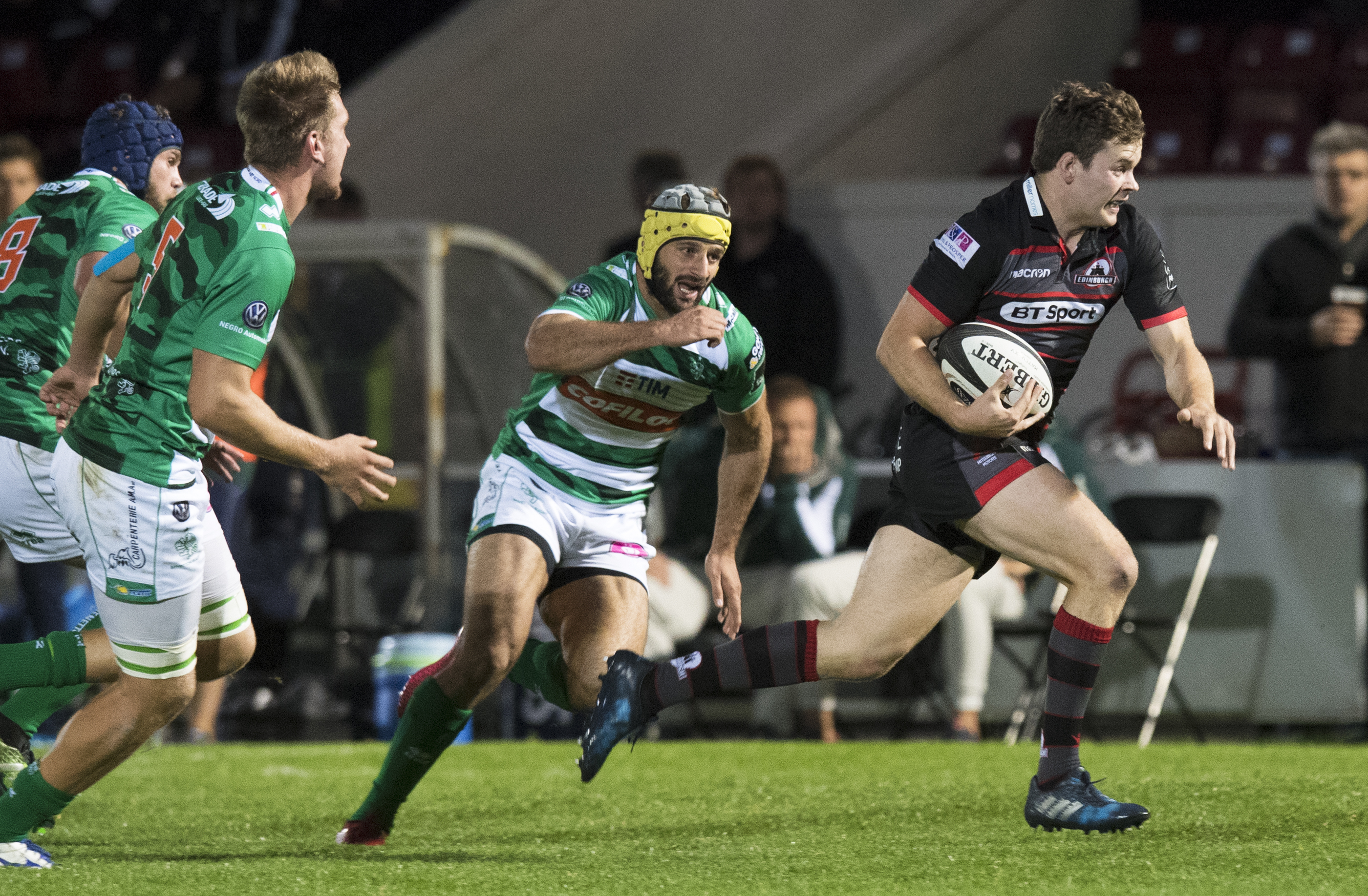 Edinburgh's Chris Dean goes through for his team's first try.