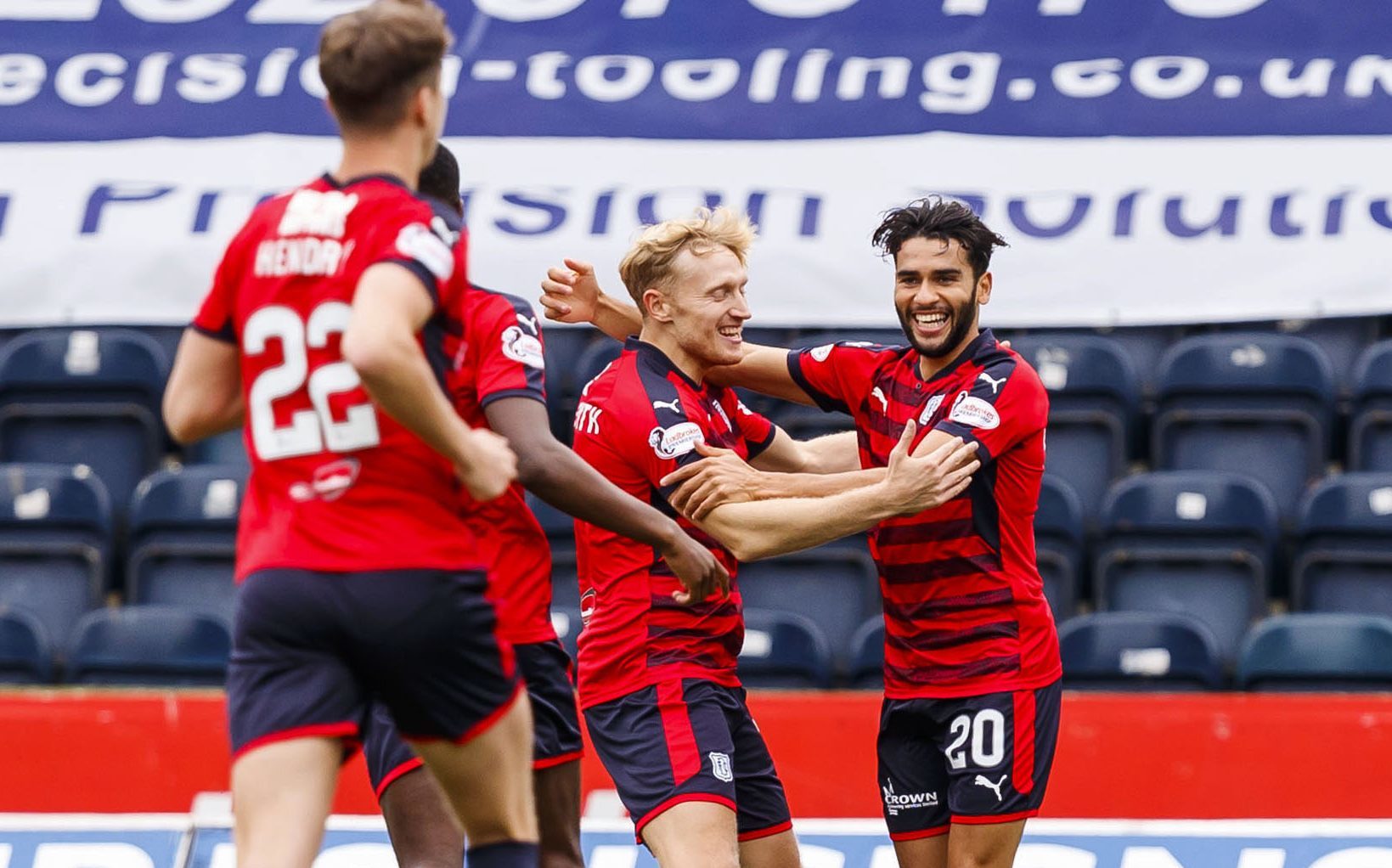 Dundee's Fassial El Bakhtaoui celebrates his goal.