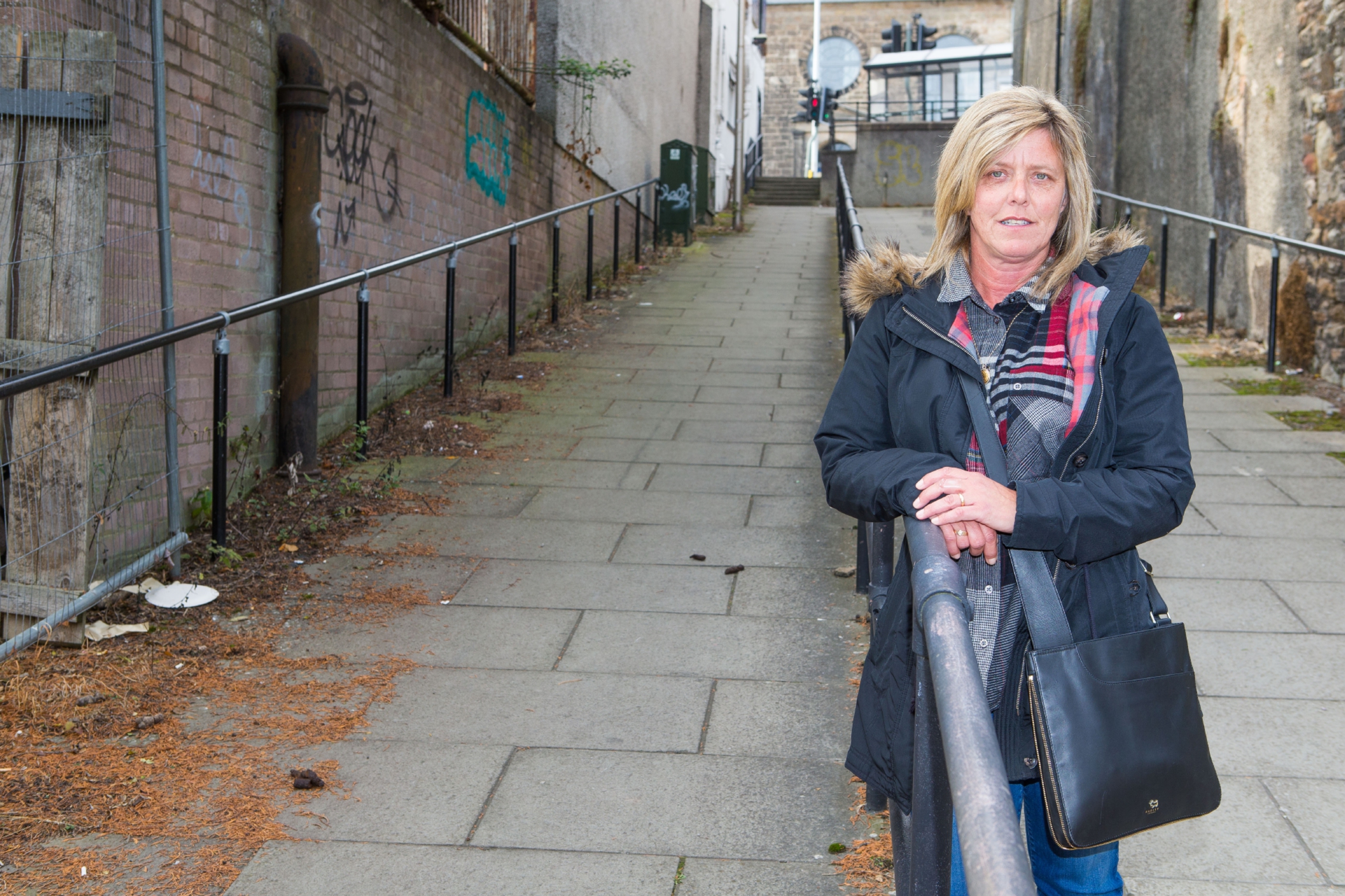 Community Warden Susan Bellfield at a main pathway for school children frequently covered in dog mess.