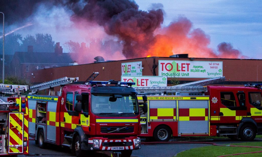 Flames shot out of the roof at the height of the blaze