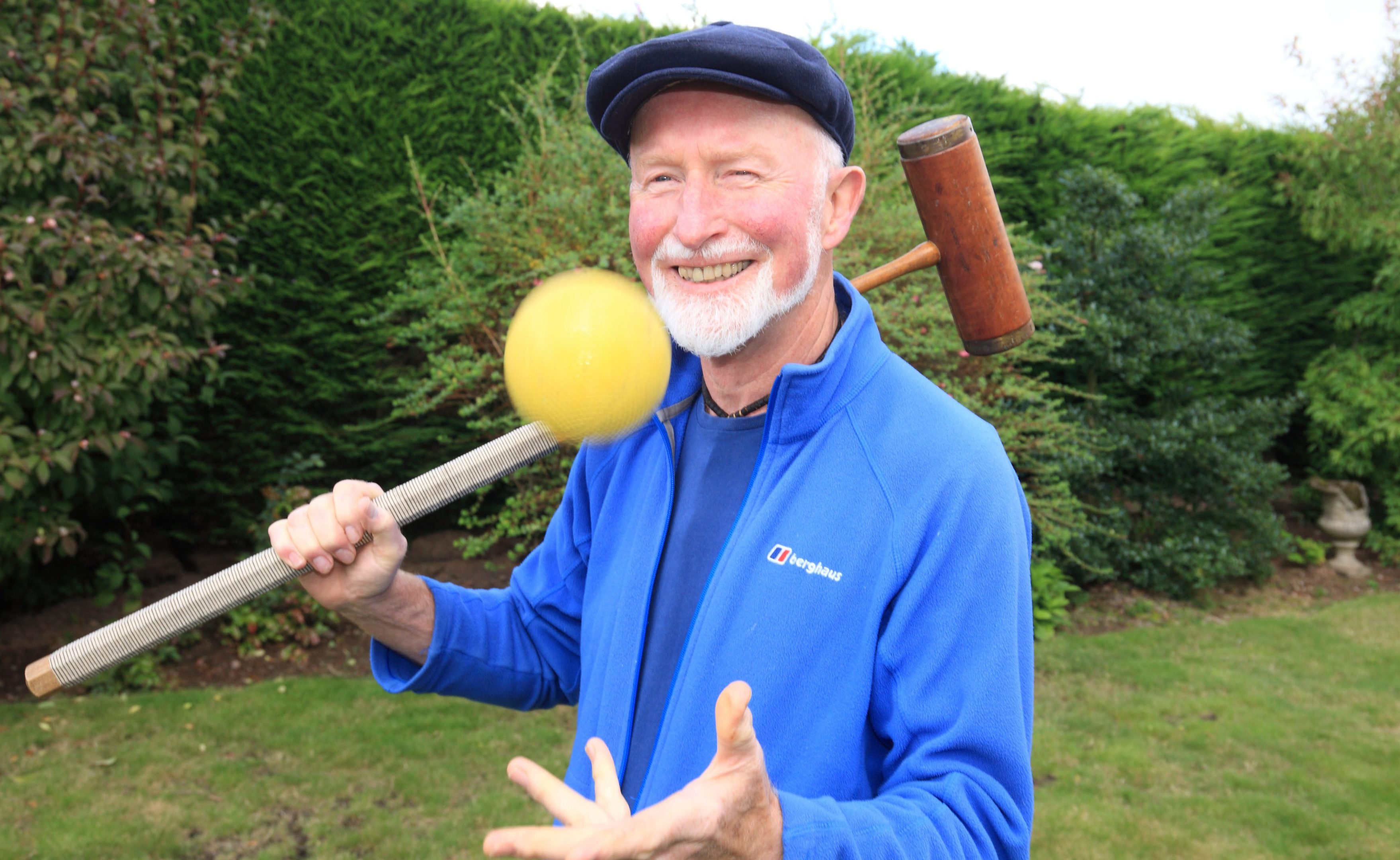 Roy Henderson with his croquet equipment.