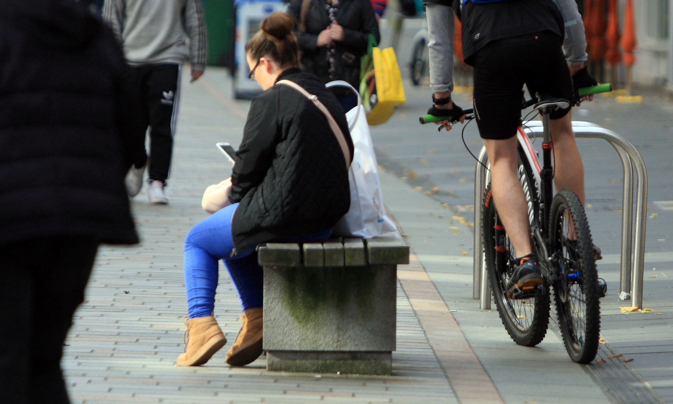 A cyclist in Perth High Street.