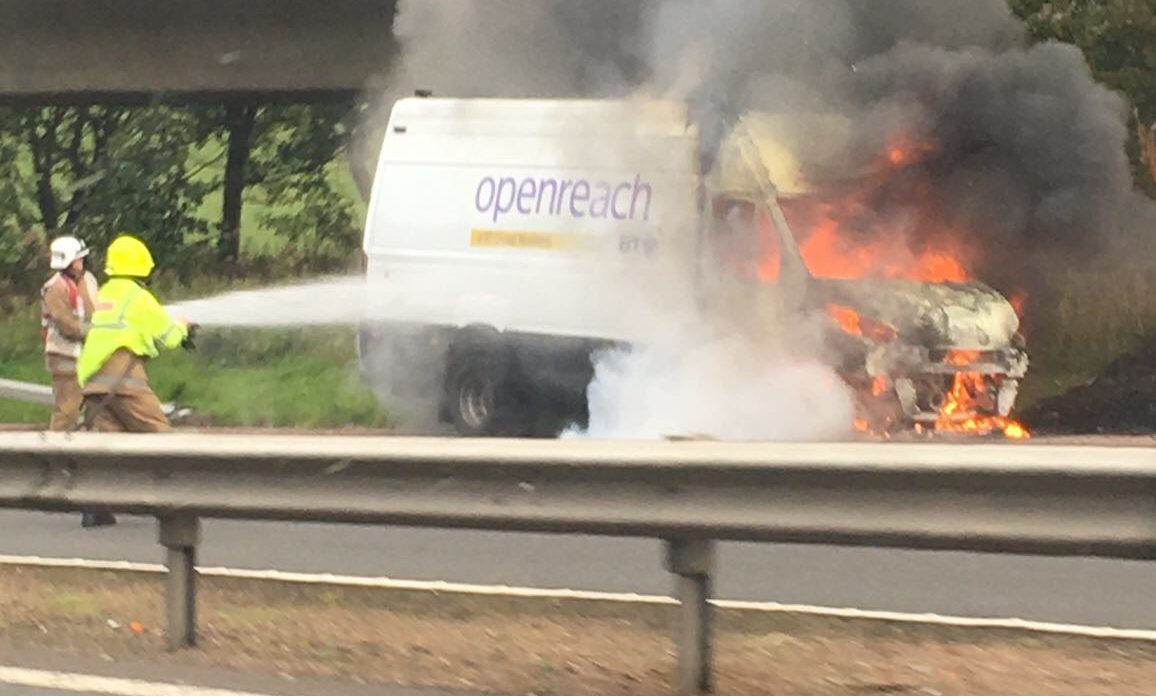 Firefighters tackle the blaze.