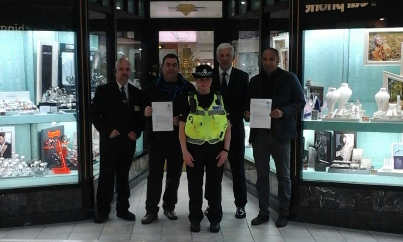 Pictured from left to right are James McGregor, security, Kenneth Oliver, PC Laura Piercy, Paul Jessop and Mustapha Zemoura