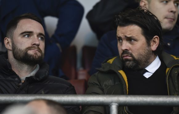 Paul Hartley with James McPake.