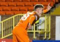 Dundee United's Logan Chalmers celebrates his late winner against Linfield.