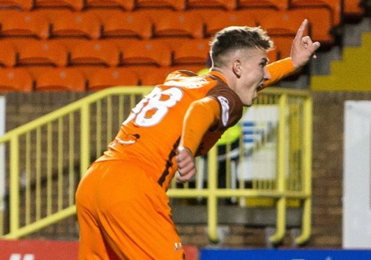 Dundee United's Logan Chalmers celebrates his late winner against Linfield.