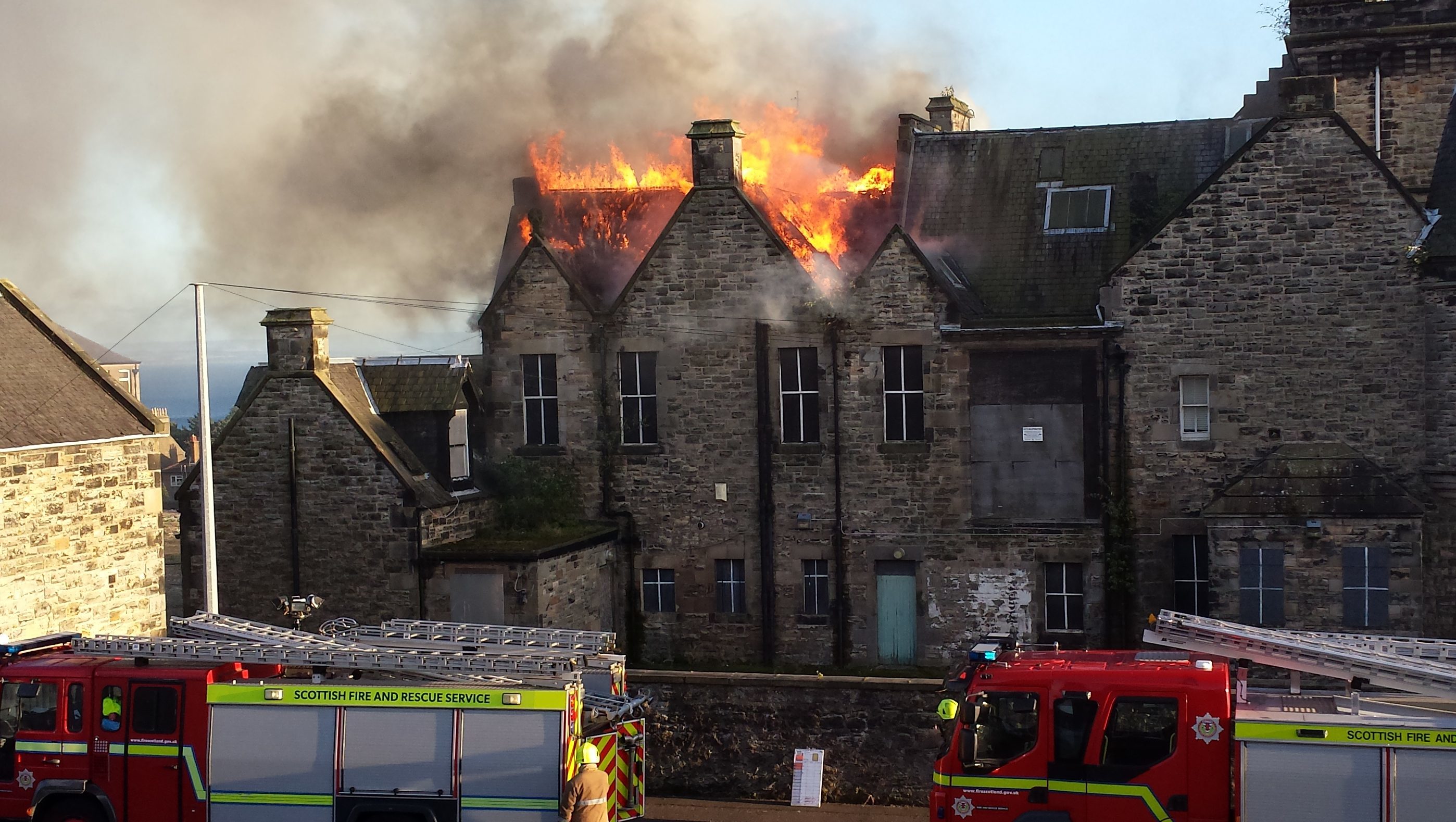 Firefighters tackling the blaze.