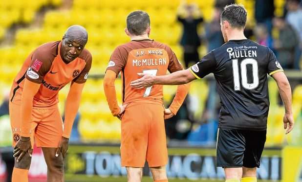 William Edjenguele, left, at full-time.