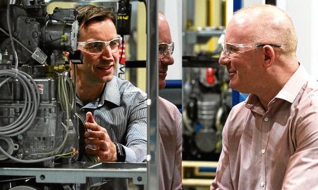 Operations Director Ken Scobie and Manufacturing Director Andy Barton inside the Dundee factory.