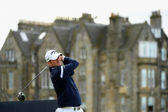 Marc Warren of England tees off on the 2nd during his final round 66 at the Dunhill Links Championship.