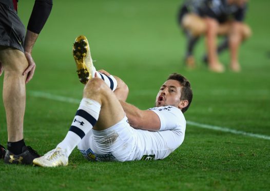 Greig Laidlaw reacts after his injury during Clermont-Ferrand's ERCC game against Ospreys on Sunday.