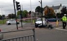 The elderly driver collided with a set of traffic lights