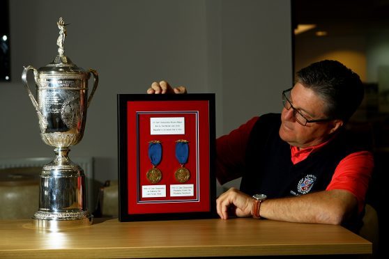 Carnoustie Golf Club Captain Bill Thompson, with the US Open Championship trophy and US Open Championship winning medals from 1906 and 1910