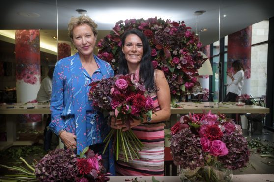 Nikki Tibbles and Gayle with her finished bouquet.