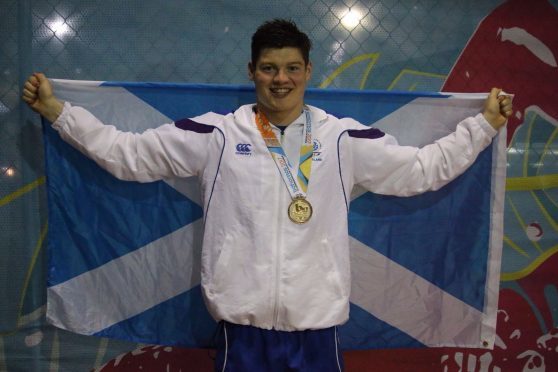 Scott McLay with one of his Commonwealth Youth Games golds.