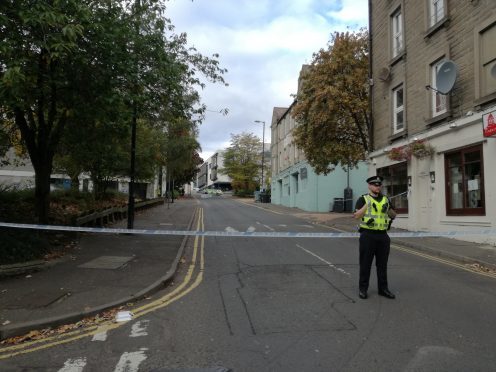 Police at the scene on Sunday morning.