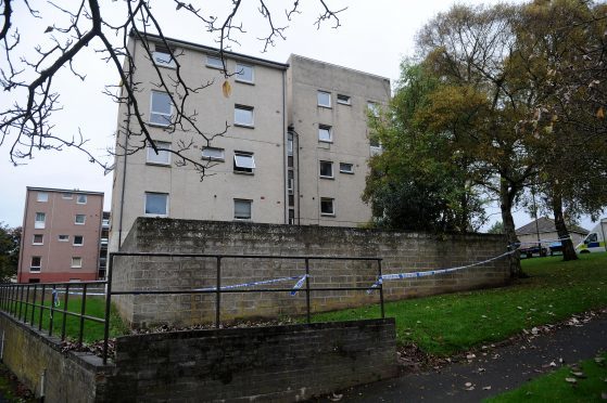 The block was cordoned off after Mark Johnston's sudden death.