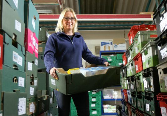 Eleanor Kelleher  at Perth Foodbank.