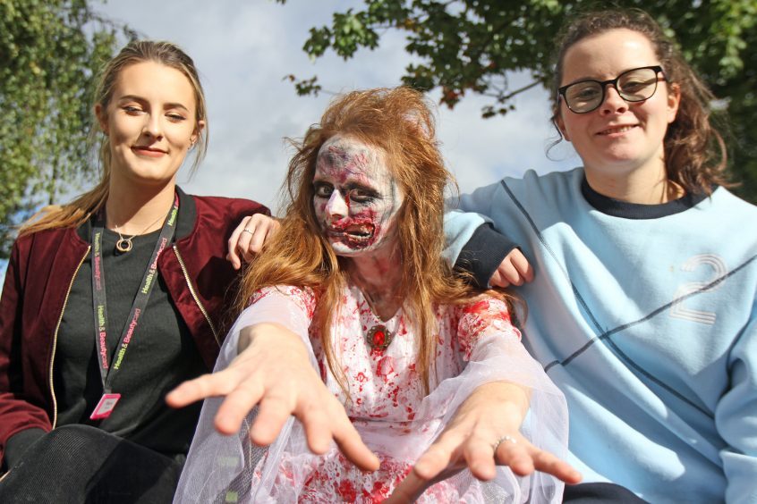 Shauna Doyle and Louise Dickson with zombie bride Mary Eadie.