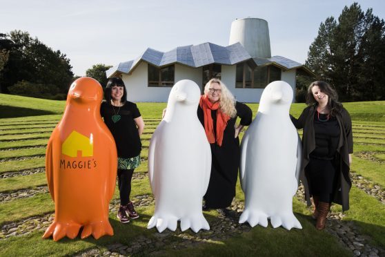 Artist coordinators Suzanne Scott and Joanne MacFadyen and penguin sculpture designer Janice Aitken.