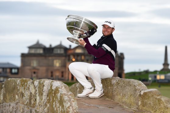 Tyrrell Hatton keeps the enormous Dunhill Links trophy for a another year.