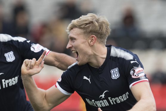 A-Jay Leitch-Smith celebrates scoring.