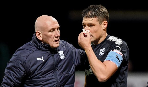 Darren O'Dea is helped off on Wednesday night.